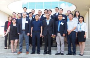 Dr. Krishna Udayakumar (Director, Duke GHIC) and Dr. Robert Eick (Former Policy Fellow, Duke-Margolis), and members of the China NHSA delegation outside the Duke Fuqua School of Business at Duke University in Durham, NC.